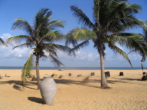 Negombo Beach | Image Credit: By S B from Sydney, Australia (Negombo Beach, Sri LankaUploaded by Ekabhishek) [CC BY 2.0], via Wikimedia Commons